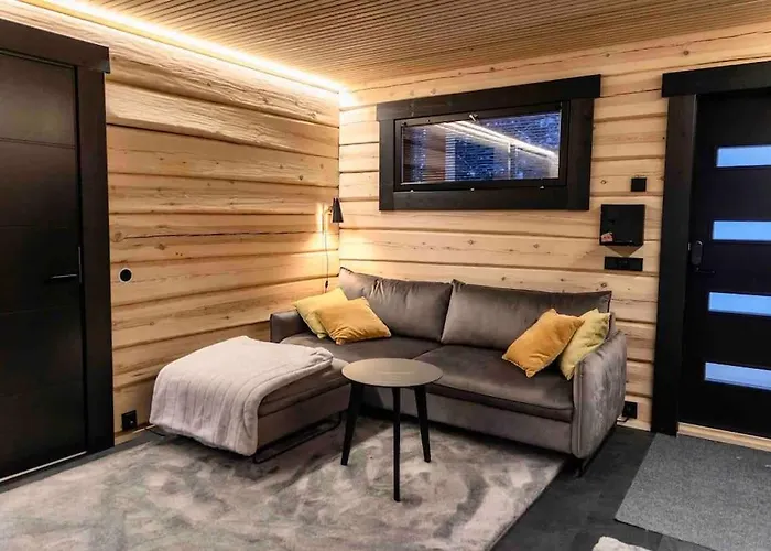 Villa Upea Lapin Kulta Hirsihuvila Inarijaerven Rannalla *